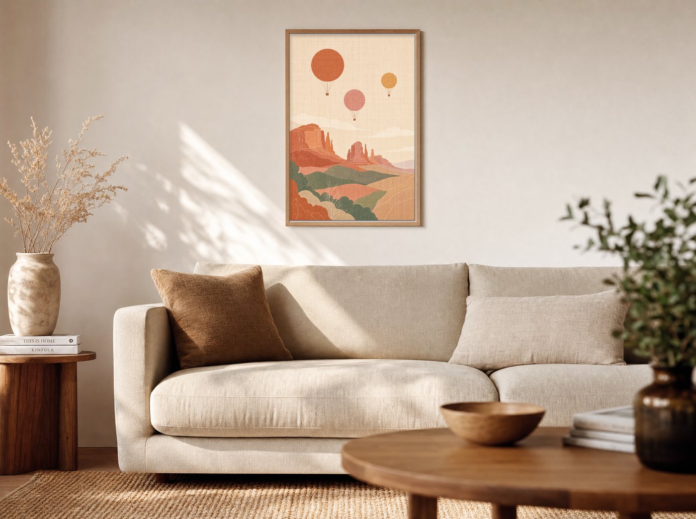 Balloons at Dawn framed and hung — a warm living room
