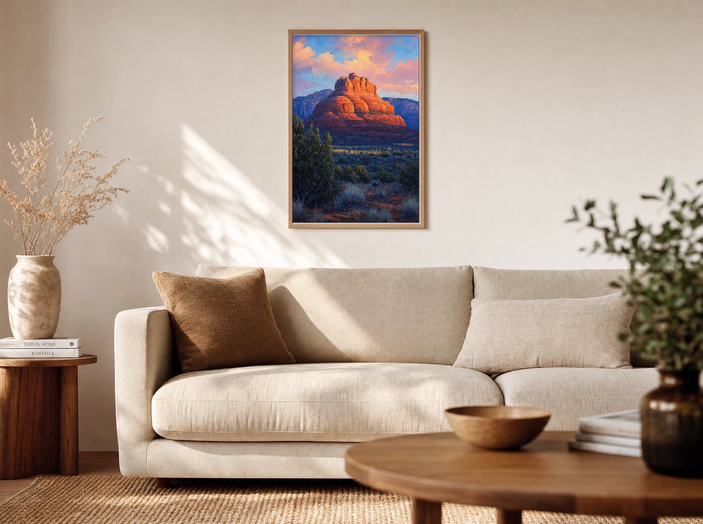 Bell Rock, First Light framed and hung — a warm living room